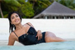 Shriya Saran turns to a beach day classic for her Maldives vacation in a chic black swimsuit